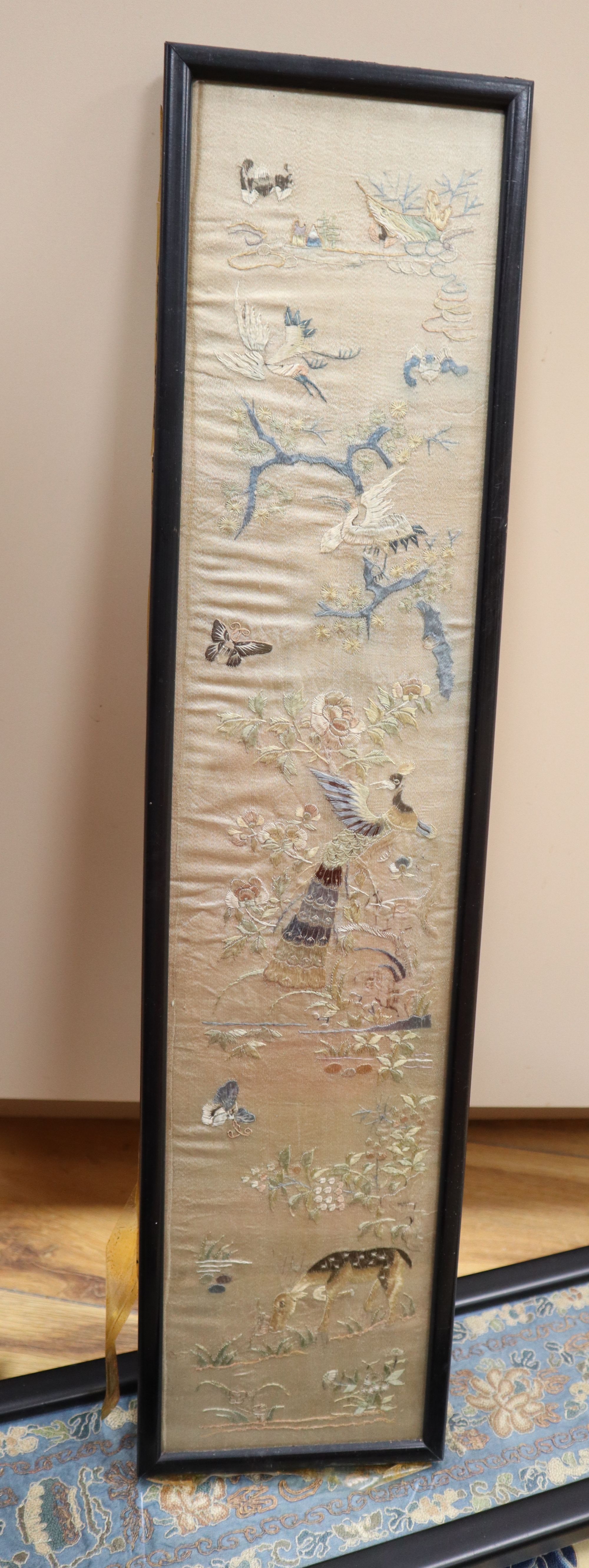 Eleven Chinese embroidered silk sleeve panels, late Qing, framed